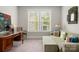 Cozy sitting room with a comfortable sofa and lots of light at 137 Brawley Woods Ln, Mooresville, NC 28115