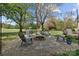 Backyard featuring fire pit, outdoor seating, and gravel area at 14855 Nc 801 Hwy Hwy, Mt Ulla, NC 28125