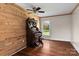 Charming bedroom with hardwood floors and natural light, complete with antique organ at 14855 Nc 801 Hwy Hwy, Mt Ulla, NC 28125
