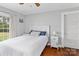 Comfortable bedroom with hardwood floors, natural light, and a serene atmosphere at 14855 Nc 801 Hwy Hwy, Mt Ulla, NC 28125