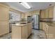 Gourmet kitchen featuring granite countertops, stainless steel appliances, and a center island at 14855 Nc 801 Hwy Hwy, Mt Ulla, NC 28125