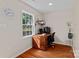 Bright office with wooden desk, large window, and natural light at 14855 Nc 801 Hwy Hwy, Mt Ulla, NC 28125