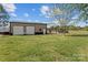 The property features a large outbuilding with camper, and a pool providing storage and recreation at 14855 Nc 801 Hwy Hwy, Mt Ulla, NC 28125