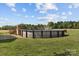 The outdoor pool area features a deck, creating a perfect spot for summer relaxation and entertainment at 14855 Nc 801 Hwy Hwy, Mt Ulla, NC 28125