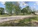 Wide driveway leads to the outbuilding, offering functional space and easy access to the property's amenities at 14855 Nc 801 Hwy Hwy, Mt Ulla, NC 28125