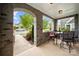 Inviting porch with brick accents, a table set, and a welcoming view of the neighborhood at 1501 Riverwalk Pkwy, Rock Hill, SC 29730