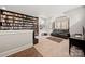 Relaxing living room with custom built in bookcase and dual reclining chairs at 1501 Riverwalk Pkwy, Rock Hill, SC 29730