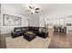 Spacious living room showcasing an open concept with hardwood floors and a contemporary design at 1501 Riverwalk Pkwy, Rock Hill, SC 29730