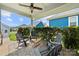 Inviting covered patio with comfortable seating and a ceiling fan, perfect for outdoor relaxation at 1501 Riverwalk Pkwy, Rock Hill, SC 29730