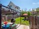 A cozy backyard space with a patio and plenty of room to entertain at 1511 Landis Ave, Charlotte, NC 28205
