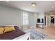 Bedroom features a window, television, and a patterned blue rug at 1511 Landis Ave, Charlotte, NC 28205
