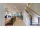 Bright, open-concept living room featuring hardwood floors and a staircase to the second level at 1511 Landis Ave, Charlotte, NC 28205