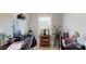 Cozy office space with a desk, shelves, and ample natural light from the window at 1511 Landis Ave, Charlotte, NC 28205