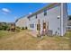 Spacious backyard with a patio, a swing and a slide at 15127 Oleander Dr, Charlotte, NC 28278
