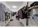Spacious walk-in closet with ample shelving and hanging space for clothes and accessories at 15127 Oleander Dr, Charlotte, NC 28278
