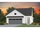 New construction single-story home with gray garage door, white siding, and professionally landscaped yard at 1619 Shoals Ave # 156, Belmont, NC 28012