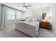 Inviting bedroom featuring neutral walls, soft carpet, and well-lit, with a charming accent lamp at 1751 Merriman Ave, Charlotte, NC 28203