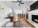 Open-concept living room flowing into a modern kitchen, perfect for entertaining and Gathering gatherings at 1751 Merriman Ave, Charlotte, NC 28203