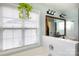 Bathroom features a soaking tub with a large window providing natural light at 2012 Galty Ln, Charlotte, NC 28270