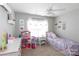 Charming bedroom features a cozy bed, playful decor, and plenty of natural light for a delightful and inviting space at 2012 Galty Ln, Charlotte, NC 28270