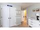 Hallway provides access to bedrooms and bathrooms at 2012 Galty Ln, Charlotte, NC 28270