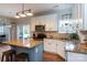 Well-lit kitchen with a center island, granite countertops, and stainless steel appliances at 2012 Galty Ln, Charlotte, NC 28270