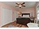 Charming bedroom featuring wood floors, ample closet space, and a cozy atmosphere at 218 Kimrod Ln, Charlotte, NC 28270