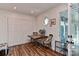 Cozy dining area with hardwood floors, a wooden table set, and natural light from a window at 218 Kimrod Ln, Charlotte, NC 28270