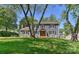 Charming two-story home with a well-maintained lawn, wood trim and inviting front porch at 218 Kimrod Ln, Charlotte, NC 28270