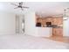 Spacious, open-concept living room with hardwood cabinets and natural lighting throughout at 2415 Tory Oak Pl, Matthews, NC 28105