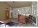 Relaxing screened-in porch with plenty of seating and natural light, perfect for outdoor living at 2415 Tory Oak Pl, Matthews, NC 28105