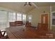 Cozy screened-in porch with a dining table and seating, perfect for enjoying the outdoors at 2415 Tory Oak Pl, Matthews, NC 28105