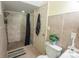 Bathroom featuring a walk-in shower, contemporary fixtures and elegant tile work at 2540 Heritage Cir, Statesville, NC 28625