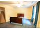 This bedroom has a window, carpeted floors, and a closet for storage needs at 2540 Heritage Cir, Statesville, NC 28625