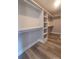 Walk-in closet with custom shelving and ample storage space at 28647 Nc Hwy 73 Hwy, Albemarle, NC 28001