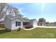 Charming home with a well-manicured front lawn and a two-car attached garage at 295 Green Meadows Dr, Taylorsville, NC 28681