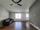 Cozy living room with hardwood floors, vaulted ceiling, and lots of natural light at 295 Green Meadows Dr, Taylorsville, NC 28681
