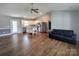 Open floor plan with stainless steel appliances, island and kitchen overlooking living space at 295 Green Meadows Dr, Taylorsville, NC 28681