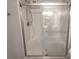 This bathroom features a glass-enclosed shower with updated fixtures at 295 Green Meadows Dr, Taylorsville, NC 28681