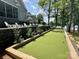 Backyard features an artificial turf bocce court near the lake at 302 Patterson'S Bridge None, New London, NC 28127