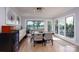 Dining area with waterfront view and stylish modern furniture at 302 Patterson'S Bridge None, New London, NC 28127