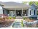 Charming front porch with stone accents, seating, and landscaped garden at 302 Patterson'S Bridge None, New London, NC 28127