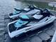Two sleek, white and blue Yamaha jet skis are docked on a platform, ready for lake adventures at 302 Patterson'S Bridge None, New London, NC 28127