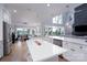 Gourmet kitchen with stainless steel appliances and large center island overlooking lake at 302 Patterson'S Bridge None, New London, NC 28127