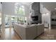 Open-concept living room with vaulted ceilings, fireplace and lake views at 302 Patterson'S Bridge None, New London, NC 28127