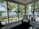 Relaxing sunroom with views of the lake and comfortable seating at 302 Patterson'S Bridge None, New London, NC 28127