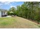 Spacious backyard with patio area, perfect for outdoor entertaining and relaxation in a serene setting at 3028 Quinebaug Rd, Fort Mill, SC 29715