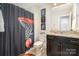 Bathroom featuring a shower with a basketball themed curtain and granite counter at 3028 Quinebaug Rd, Fort Mill, SC 29715