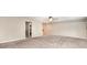 Expansive bonus room featuring neutral colors and ceiling fan at 3028 Quinebaug Rd, Fort Mill, SC 29715