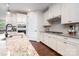 Well-lit kitchen with ample counter space, stainless steel appliances, and plenty of storage in the cabinets at 3028 Quinebaug Rd, Fort Mill, SC 29715